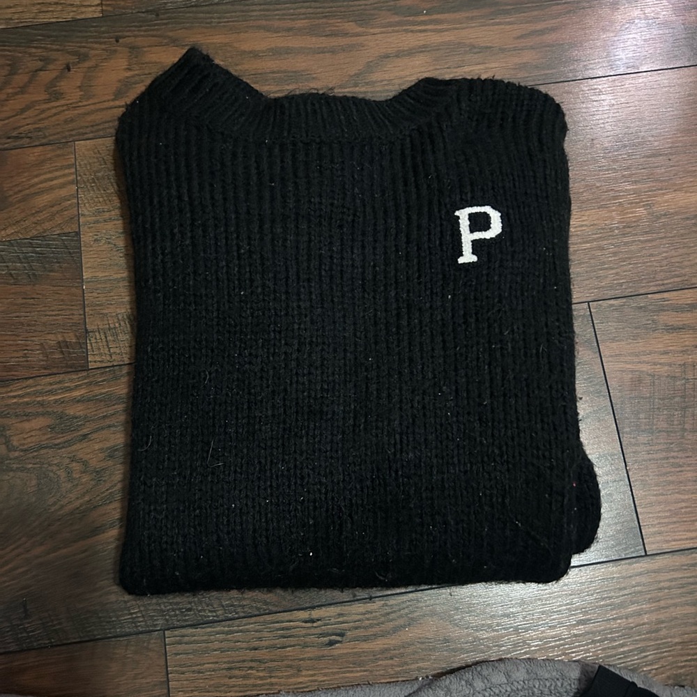 Black Ribbed Sweater with 'P' Logo